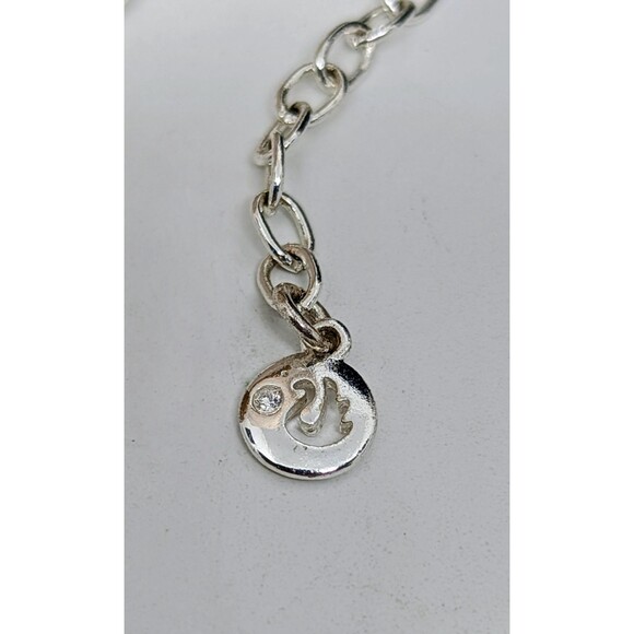 Gloria Vanderbilt Amber and Amethyst Seven Crystal Stones Adjustable Necklace - Picture 3 of 4